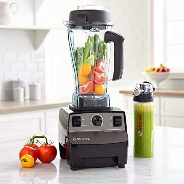 Vitamix with vegetables inside the jar