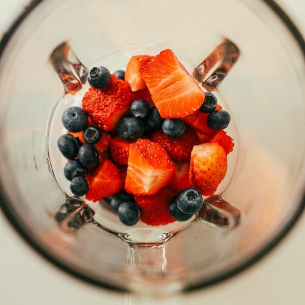  blueberries and strawberries in a blender